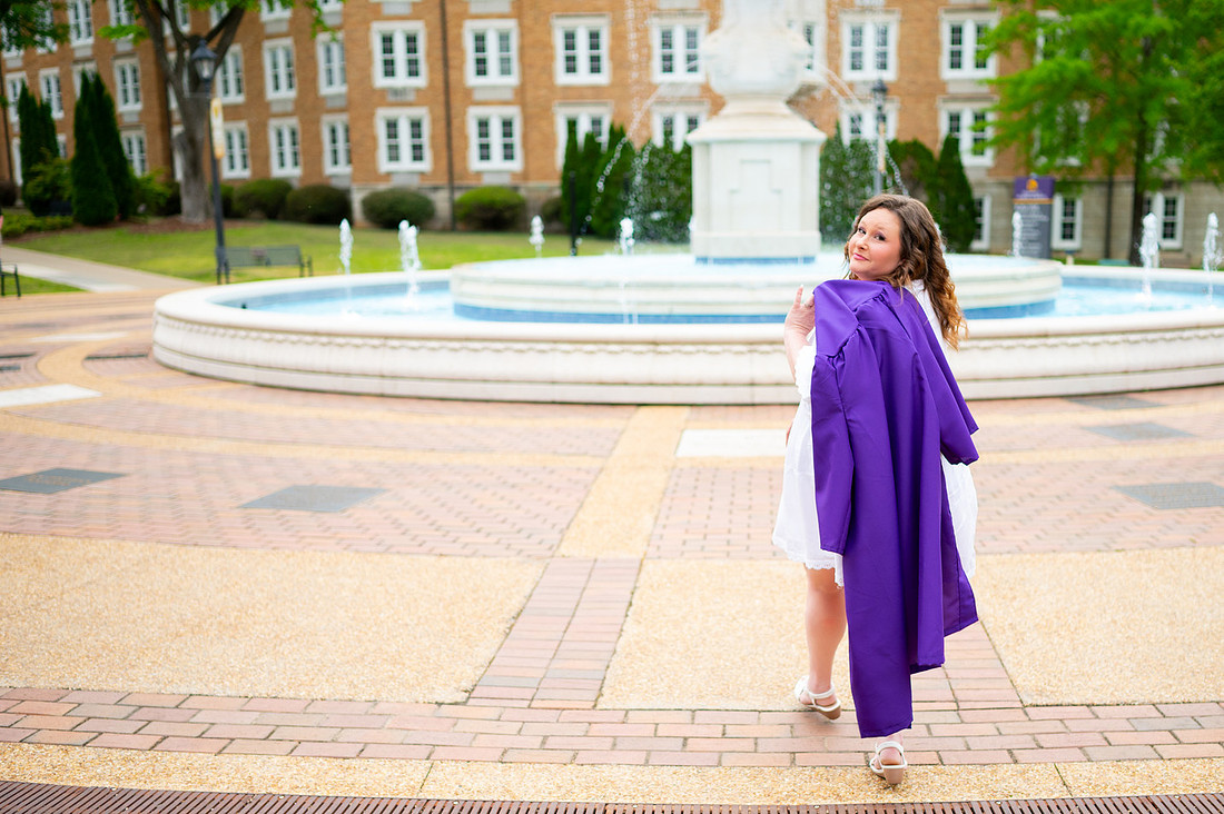 Graduate celebrating during a North Alabama senior photography session