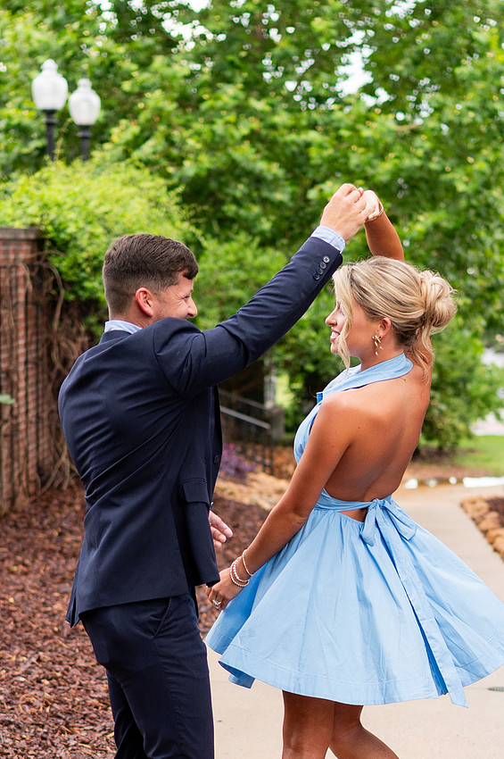 Young couple dancing in formal attire